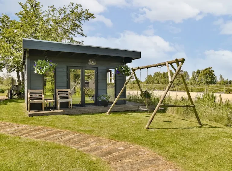 compact garden room installed in small backyard space Milton Keynes